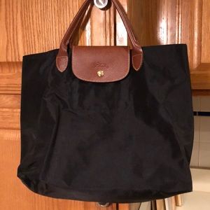 Longchamp black nylon tote. Snap top. 12”H x 16”W x 6”D